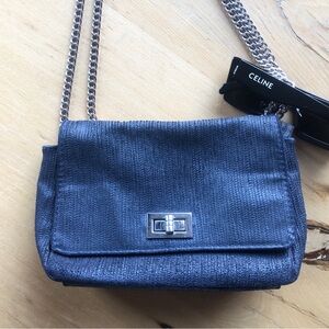 Leather bag with metal chain